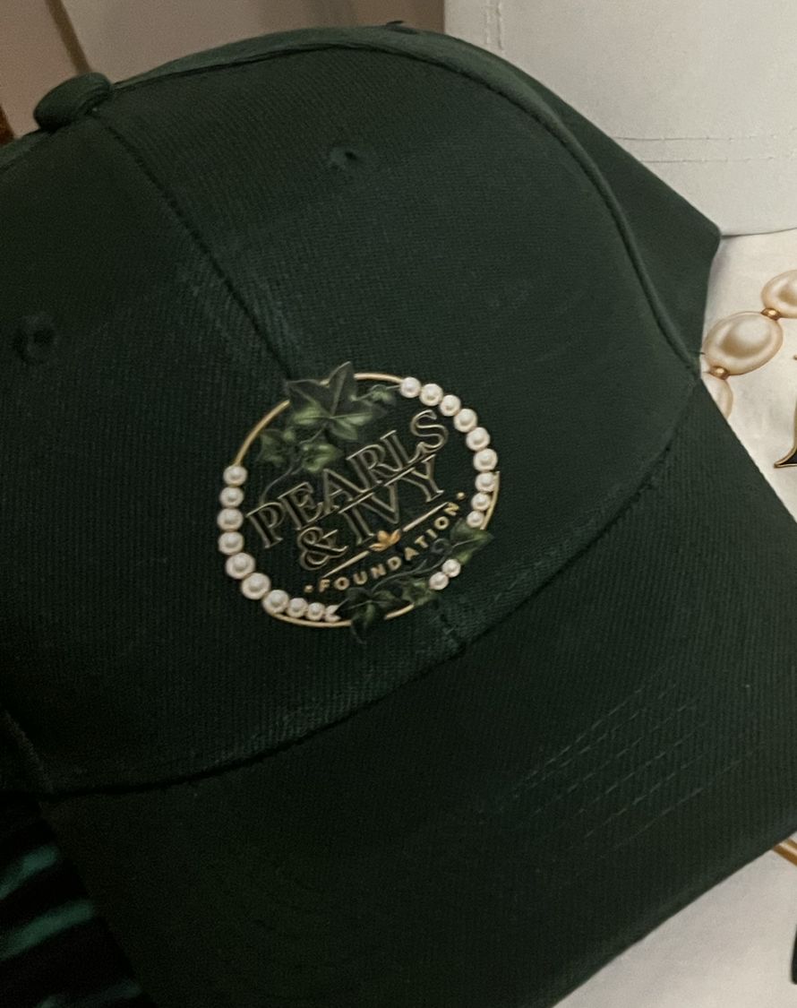 Forest green cap with Pearls & Ivy logo