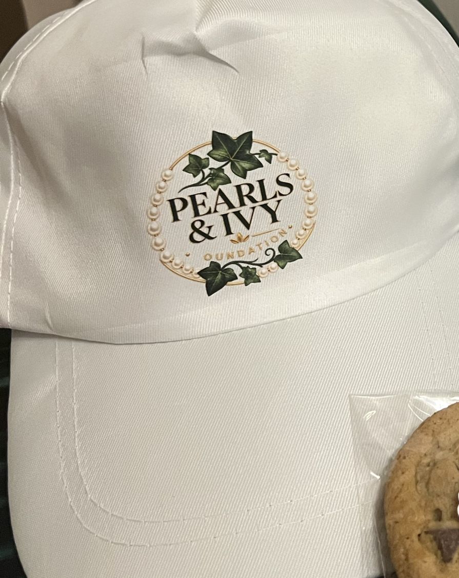 White cap with Pearls & Ivy logo
